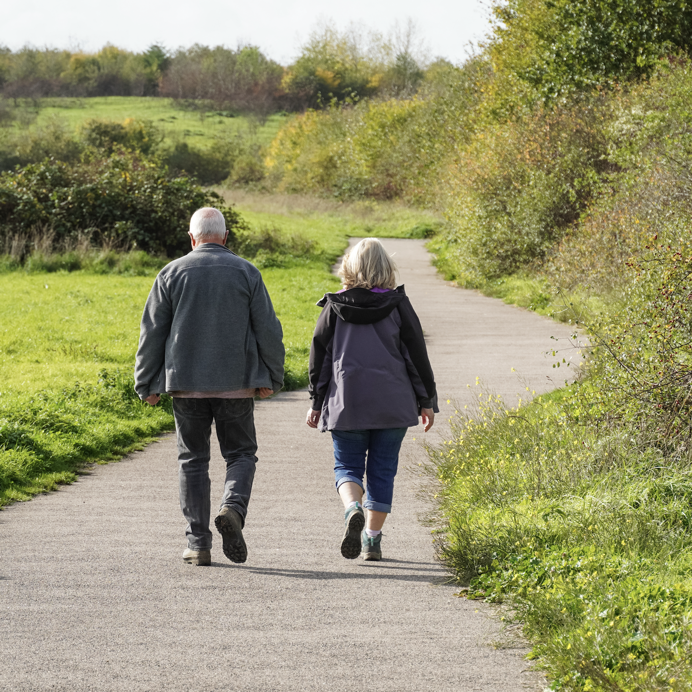 Couple walking on walking path